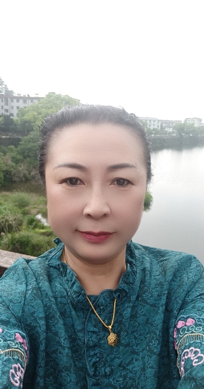 雨中情的第二张照片--宜昌相亲服务中心